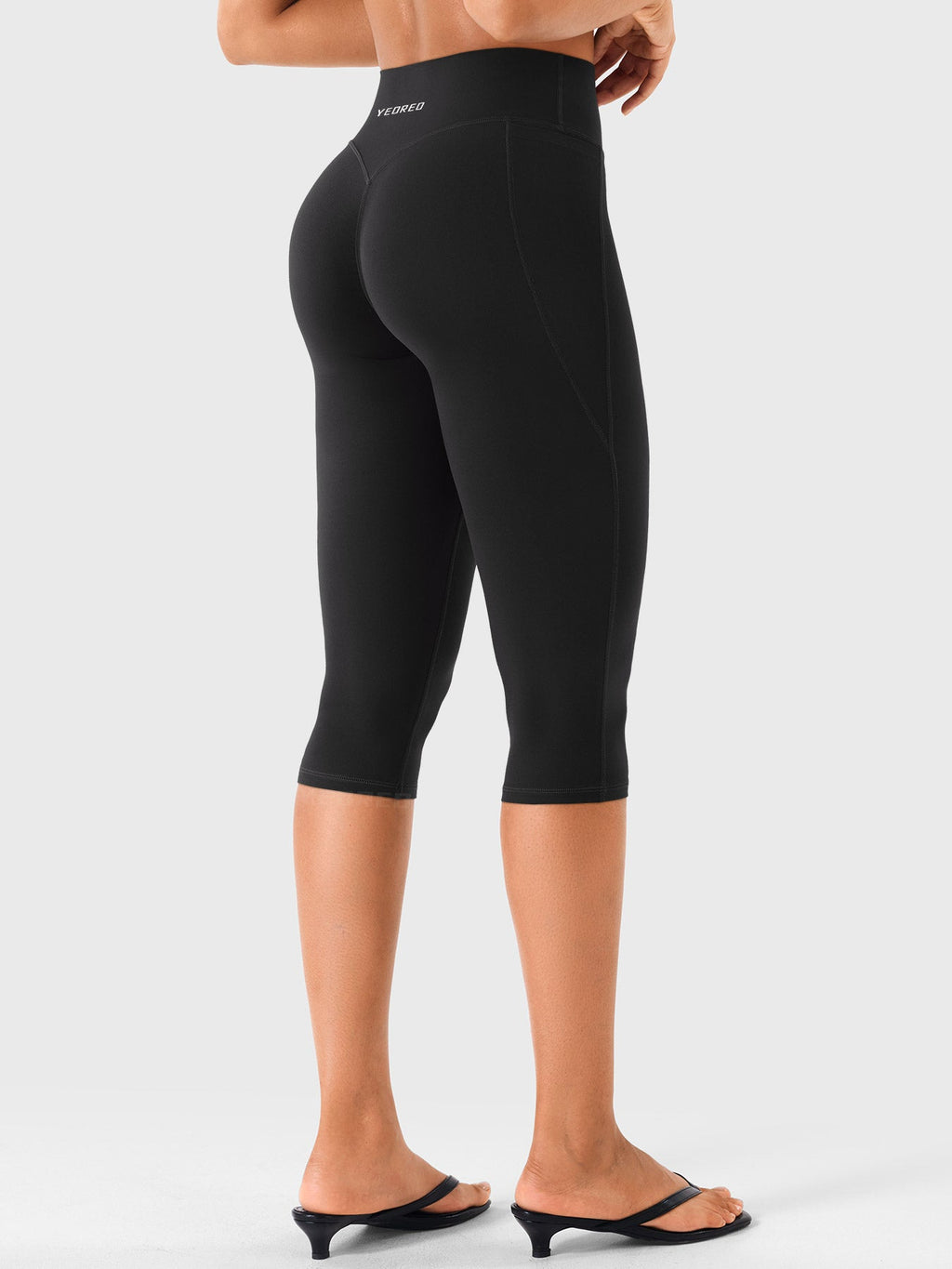 Leggings Capri Ease con Bolsillos
