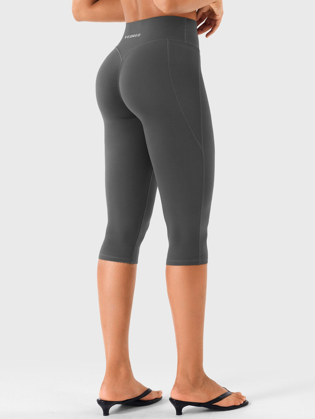 Leggings Capri Ease con Bolsillos