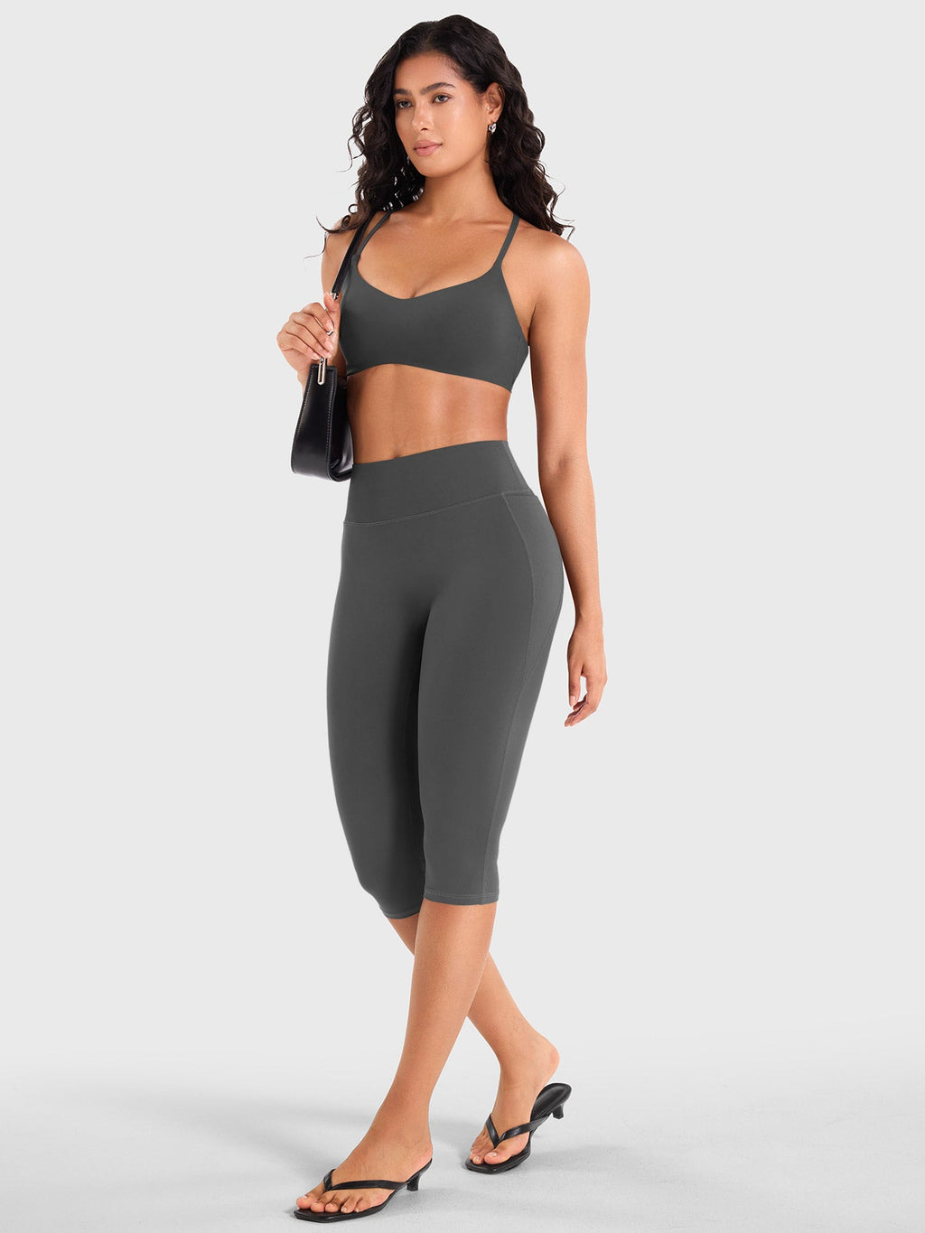 Leggings Capri Ease con Bolsillos