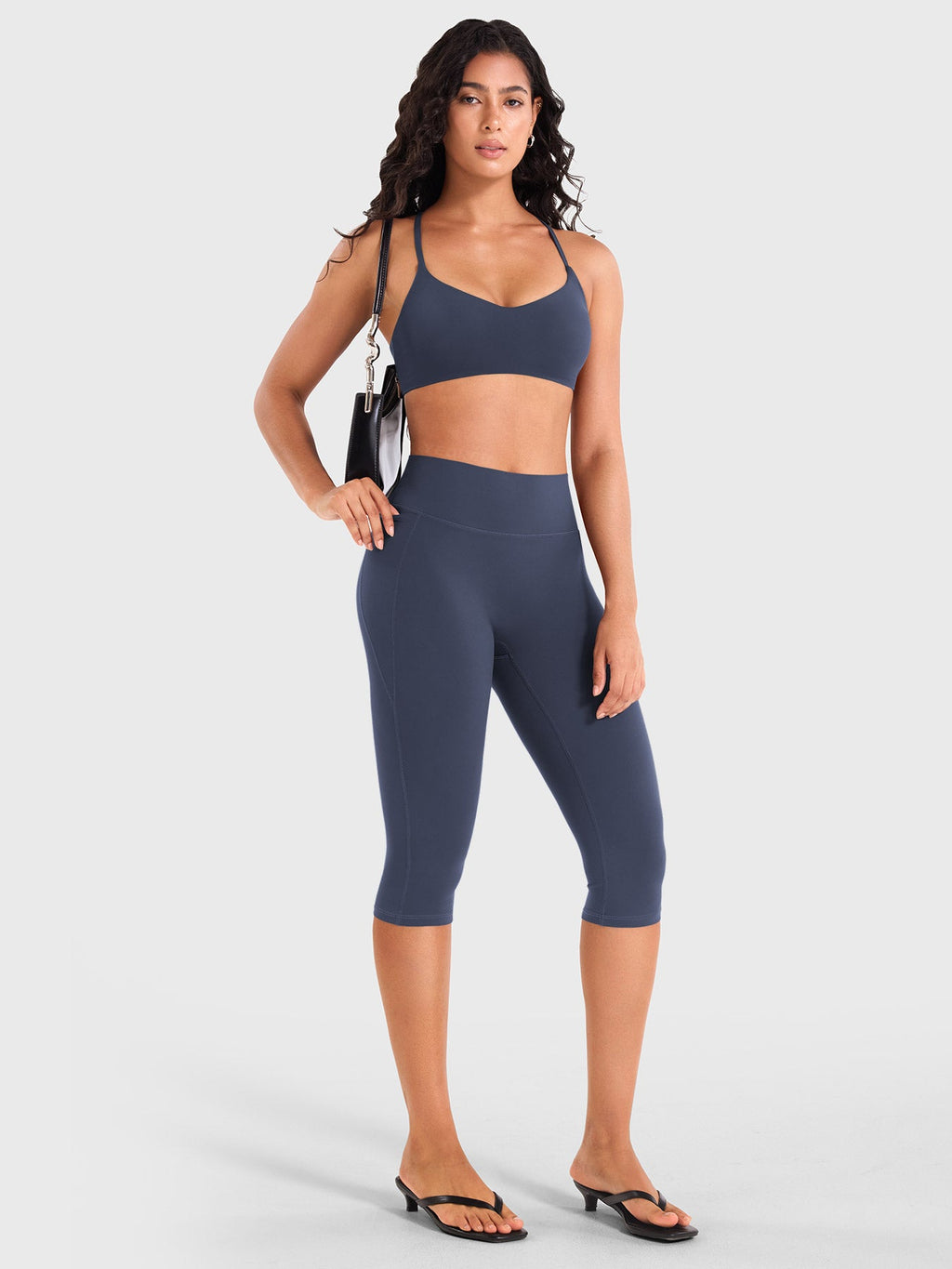 Leggings Capri Ease con Bolsillos